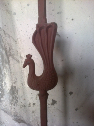 Peacock cast iron design