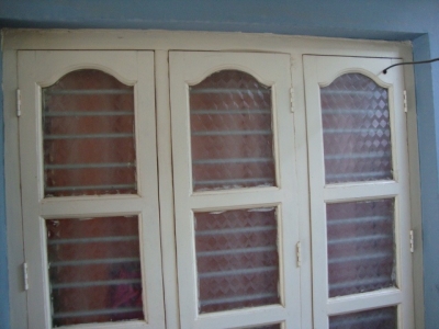 wooden window with shutter designs